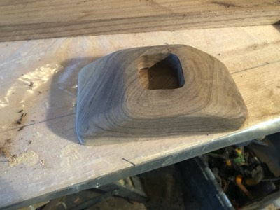  Mast step is shaped from a piece of walnut. 