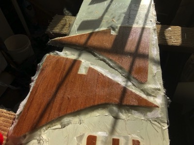  5/27/18 - Pieces of the new kick-up rudder are fiberglassed. 