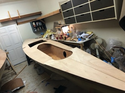  3/12/18 - The deck panels are placed on the hull after given a fill coat of epoxy on the underside. 