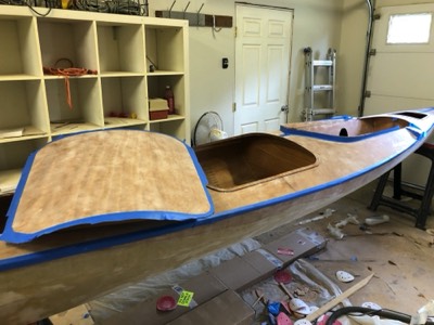  6/1/18 - The deck and hatch covers are taped in preparation for varnishing. 