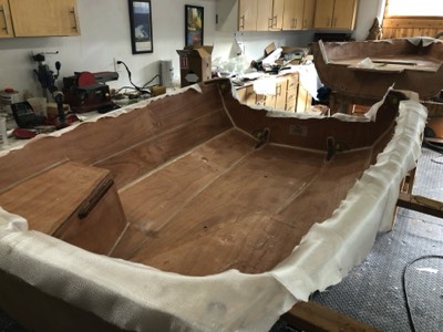  10/14/19 - The exposed top edges of the boat are coverd with fiberglass. 