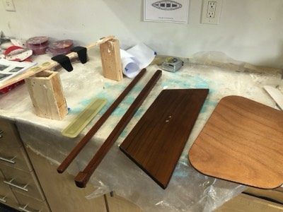  First coat of varnish on the extra pieces. 