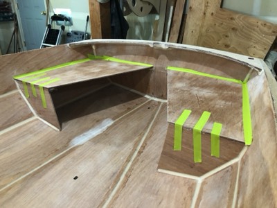  5/26/20 - The aft seat tops are taped in place in order to put in a blind fillet. 