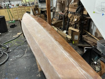  3/28/22 - Half of the hull is sanded. 