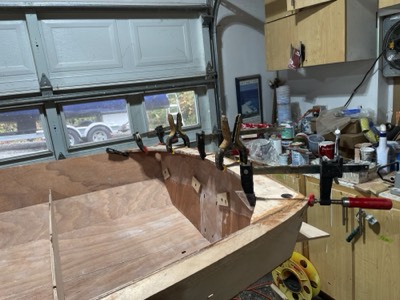  10/24/22 - The transom inwale is epoxied in place. 