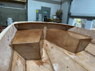  3/26/24 - Aft seat corners are fiberglassed and a fill coat is applied. 