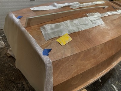  4/17/24 - The transom and skeg are prepped for fiberglassing.  