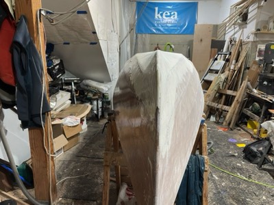  9/3/24 - Half of the hull is sanded. 