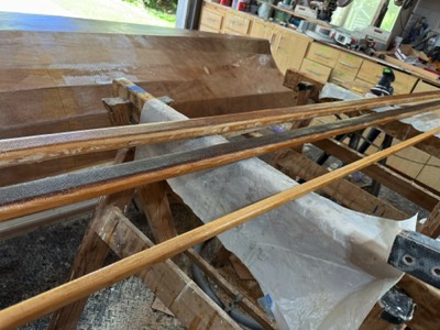  4/18/25 - The custom booms are fiberglassed and the tiller is epoxy sealed.  