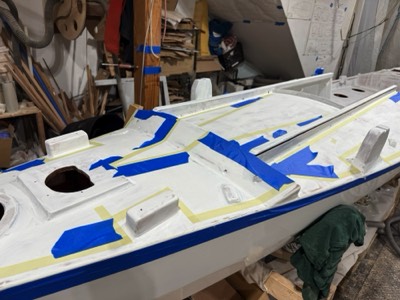  5/15/25 - The paint pattern on the deck is taped out.  