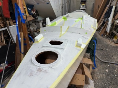  5/23/25 - The deck is taped off for red paint.  