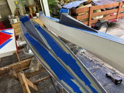  5/23/25 - The ama decks are taped off for white paint.  