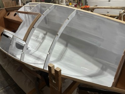  2/11/25 - First coat of primer is applied to cabin.  