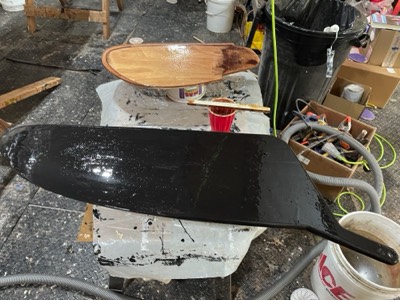  Centerboard and rudder are given fill coats. CB has graphite powder in the epoxy. 