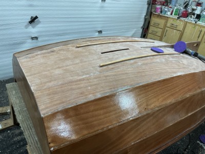  3/24/23 - Part of the hull is sanded.  