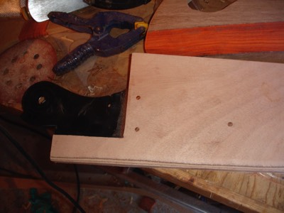  The extend rudder I am making for the rig. Bronze nails are used to keep the rudder insert in place. 