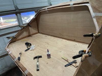  3/15/22 - The rear hatch sill is epoxied in place. 